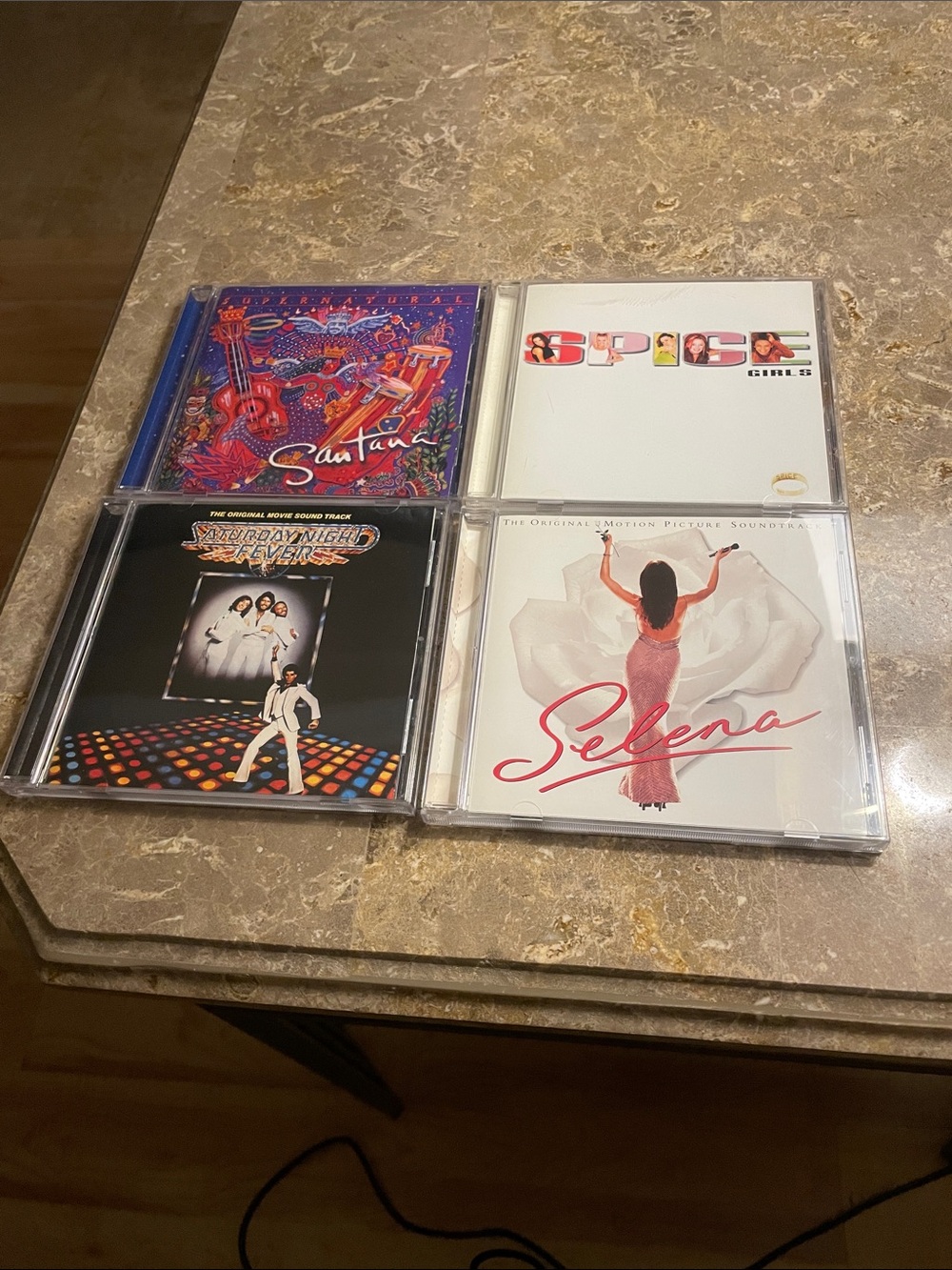 Santana, Spice Girls, Saturday Night Fever Soundtrack, & Selena CD Bundle